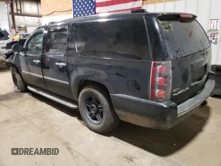 2012 GMC Yukon XL Denali with VIN 1GKS2MEFXCR319109, listed as a Copart auction lot 77485124 with Not Provided miles and Salvage Title. Bid and sale history available at carsss.com. Image 2.