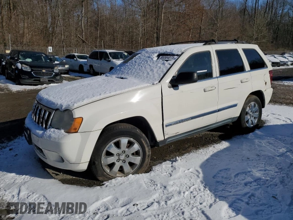 2009 Jeep Grand Cherokee Limited with VIN 1J8GR58K99C547604, listed as a Copart auction lot 88304075 with 209,833 mi miles and Salvage title. Bid and sale history available at DreamBid. Image 1.