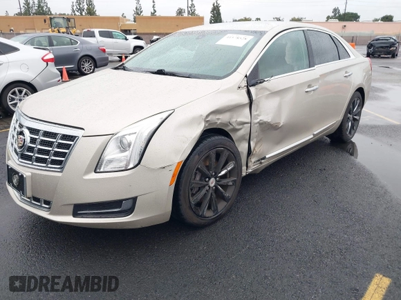 2013 Cadillac XTS z VIN 2G61N5S32D9127146, wystawiony jako IAAI lot #41578528 z przebiegiem 98 529 mil mil oraz . Historia ofert i sprzedaży dostępna na DreamBid. Obrazek 2.