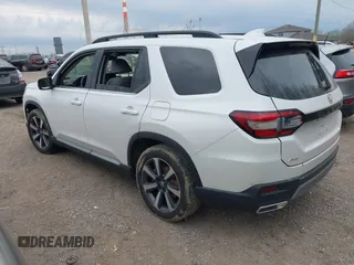 2023 Honda Pilot Elite with VIN 5FNYG1H80PB020937, listed as a IAAI auction lot 42024743 with 20,740 mi miles and . Bid and sale history available at DreamBid. Image 3.
