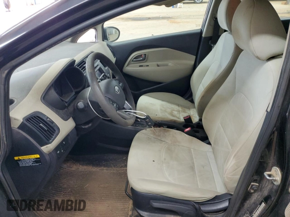 2012 Kia Rio LX with VIN KNADM4A34C6072811, listed as a Copart auction lot 68295334 with 77,167 mi miles and Salvage Title. Bid and sale history available at DreamBid. Image 7.