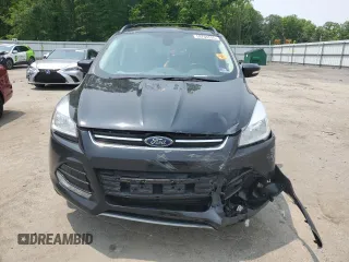 2013 Ford Escape SEL z VIN 1FMCU9H94DUD47723, wystawiony jako Copart lot #59765595 z przebiegiem 129 551 mil mil oraz Szkoda całkowita • Salvage title. Historia ofert i sprzedaży dostępna na DreamBid. Obrazek 5.