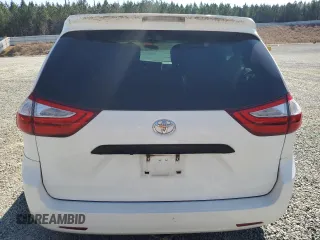 2017 Toyota Sienna L with VIN 5TDZZ3DC4HS779589, listed as a Copart auction lot 48860415 with 128,566 mi miles and Salvage Title. Bid and sale history available at DreamBid. Image 6.