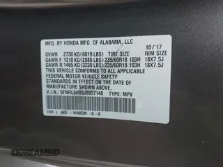 2018 Honda Odyssey Touring with VIN 5FNRL6H89JB057148, listed as a IAAI auction lot 42511909 with 166,438 mi miles and . Bid and sale history available at DreamBid. Image 9.