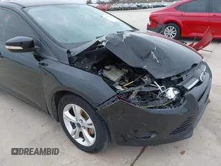 2013 Ford Focus SE with VIN 1FADP3F29DL157950, listed as a IAAI auction lot 41617844 with 128,890 mi miles. Bid and sale history available at carsss.com. Image 6.