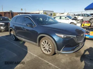 2018 Mazda CX-9 Grand Touring z VIN JM3TCADY3J0207176, wystawiony jako Copart lot #50222325 z przebiegiem 76 856 mil mil oraz Szkoda całkowita • Salvage title. Historia ofert i sprzedaży dostępna na DreamBid. Obrazek 4.