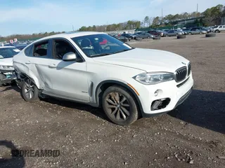 2019 BMW X6 xDrive35i z VIN 5UXKU2C52K0Z64519, wystawiony jako IAAI lot #41970216 z przebiegiem 90 181 mil mil oraz . Historia ofert i sprzedaży dostępna na DreamBid. Obrazek 1.