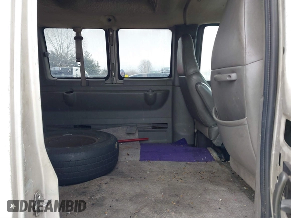 2005 Chevrolet Express Passenger with VIN 1GAHG39U151241968, listed as a IAAI auction lot 41281430 with 148,748 mi miles and . Bid and sale history available at DreamBid. Image 8.