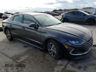 2022 Hyundai Sonata Hybrid Blue with VIN KMHL24JJ5NA051528, listed as a Copart auction lot 82478744 with 66,784 mi miles and Salvage Title. Bid and sale history available at carsss.com. Image 4.