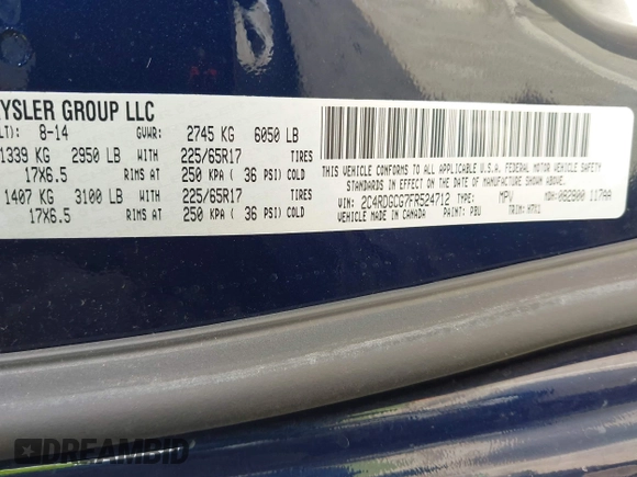 2015 Dodge Grand Caravan SXT with VIN 2C4RDGCG7FR524712, listed as a IAAI auction lot 41956063 with 111,144 mi miles and . Bid and sale history available at DreamBid. Image 9.