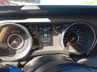 2020 Jeep Wrangler Unlimited Sport S z VIN 1C4HJXDN5LW204468, wystawiony jako IAAI lot #41855289 z przebiegiem 62 610 mil mil oraz . Historia ofert i sprzedaży dostępna na DreamBid. Obrazek 7.