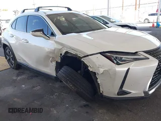 2022 Lexus UX 250h with VIN JTHX9JBH5N2054854, listed as a IAAI auction lot 42009922 with 57,944 mi miles and . Bid and sale history available at DreamBid. Image 6.