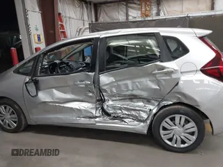 2016 Honda Fit LX with VIN JHMGK5H57GX008358, listed as a IAAI auction lot 42473358 with 43,158 mi miles and . Bid and sale history available at DreamBid. Image 14.