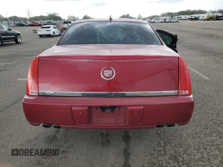 2008 Cadillac DTS 1SD z VIN 1G6KD57Y28U173094, wystawiony jako Copart lot #56895415 z przebiegiem 141 060 mil mil oraz Szkoda całkowita • Salvage title. Historia ofert i sprzedaży dostępna na DreamBid. Obrazek 6.