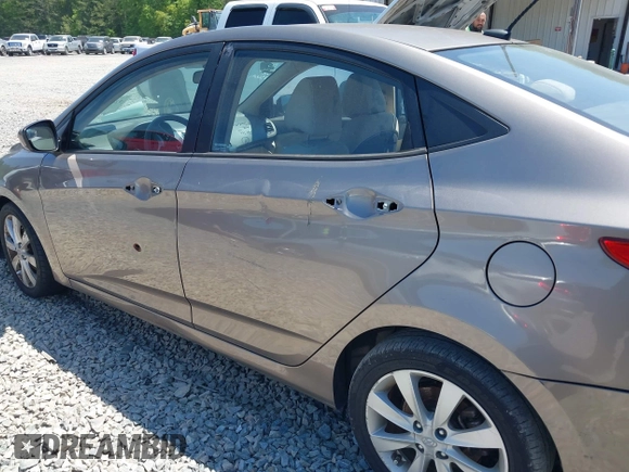 2014 Hyundai Accent GLS with VIN KMHCU4AE7EU736691, listed as a IAAI auction lot 42054514 with 80,715 mi miles and . Bid and sale history available at carsss.com. Image 6.