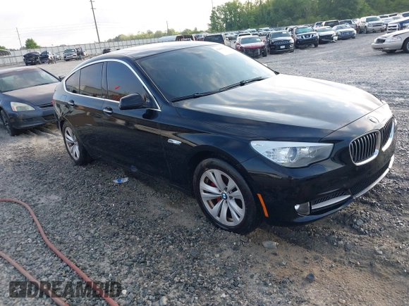 2013 BMW 5 Series GT 535i xDrive with VIN WBASP2C50DC338989, listed as a IAAI auction lot 42041585 with 121,429 mi miles. Bid and sale history available at carsss.com. Image 1.