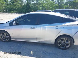 2020 Toyota Prius L Eco z VIN JTDKARFUXL3125434, wystawiony jako IAAI lot #42201623 z przebiegiem 58 609 mil mil oraz . Historia ofert i sprzedaży dostępna na DreamBid. Obrazek 14.