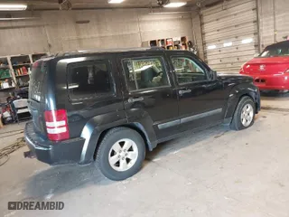 2009 Jeep Liberty Sport with VIN 1J8GN28K79W547903, listed as a IAAI auction lot 41889962 with 127,821 mi miles. Bid and sale history available at carsss.com. Image 4.