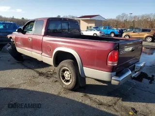 2000 Dodge Dakota SLT with VIN 1B7GG22X7YS639007, listed as a Copart auction lot 84829204 with 148,408 mi miles and Salvage Title. Bid and sale history available at DreamBid. Image 2.