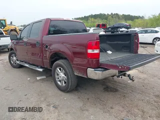 2006 Ford F-150 XLT with VIN 1FTRW12W66FA21762, listed as a IAAI auction lot 41835523 with 238,961 mi miles. Bid and sale history available at carsss.com. Image 3.