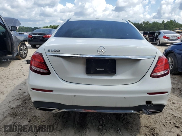 2017 Mercedes-Benz E 300 Luxury with VIN WDDZF4JB0HA010018, listed as a Copart auction lot 61529565 with Not provided miles and Salvage title. Bid and sale history available at DreamBid. Image 6.