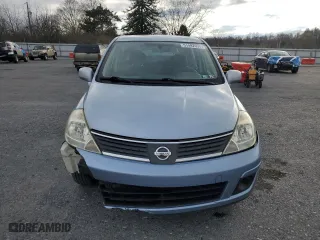 2009 Nissan Versa 1.8 S with VIN 3N1BC13E69L475670, listed as a Copart auction lot 51492935 with 118,754 mi miles and Salvage Title. Bid and sale history available at carsss.com. Image 5.