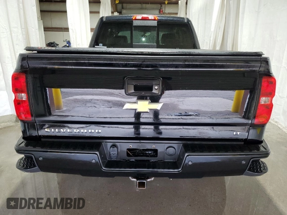 2017 Chevrolet Silverado 1500 LT with VIN 1GCVKREC0HZ141018, listed as a Copart auction lot 52708255 with 96,790 mi miles and Salvage Title. Bid and sale history available at DreamBid. Image 6.