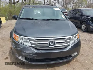 2012 Honda Odyssey Touring with VIN 5FNRL5H99CB028304, listed as a IAAI auction lot 42031916 with 216,185 mi miles and . Bid and sale history available at DreamBid. Image 13.