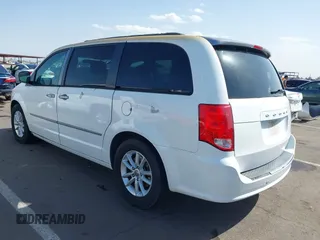 2013 Dodge Grand Caravan SXT with VIN 2C4RDGCG3DR600651, listed as a IAAI auction lot 41947769 with 201,824 mi miles and . Bid and sale history available at DreamBid. Image 3.