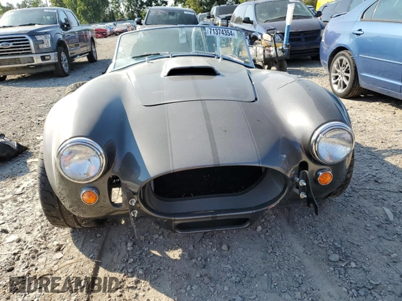 2022 Ford Mustang with VIN ME7700, listed as a Copart auction lot 71374354 with Not provided miles and Salvage title. Bid and sale history available at DreamBid. Image 5.