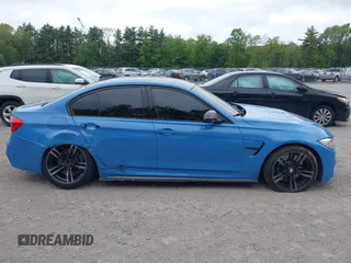 2016 BMW M3 z VIN WBS8M9C57GP966908, wystawiony jako IAAI lot #42318665 z przebiegiem 50 498 mil mil oraz . Historia ofert i sprzedaży dostępna na DreamBid. Obrazek 13.