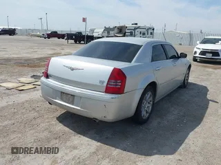2005 Chrysler 300 with VIN 2C3JA63H05H693522, listed as a IAAI auction lot 41847279 with 162,037 mi miles. Bid and sale history available at carsss.com. Image 4.