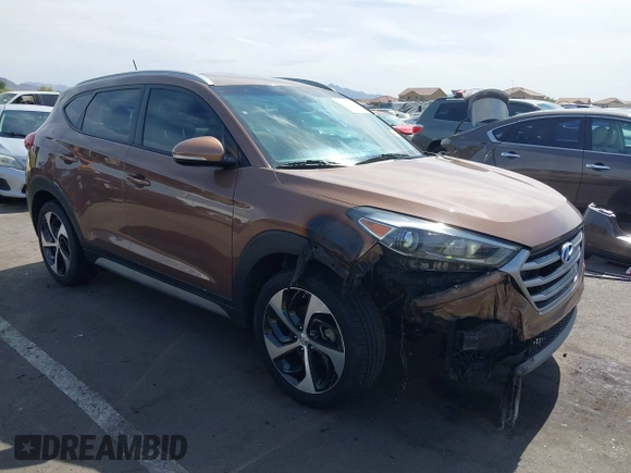 2017 Hyundai Tucson Value z VIN KM8J33A21HU495872, wystawiony jako IAAI lot #42235210 z przebiegiem 158 185 mil mil oraz . Historia ofert i sprzedaży dostępna na DreamBid. Obrazek 1.
