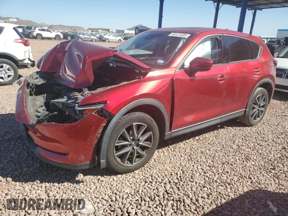 2017 Mazda CX-5 Grand Touring with VIN JM3KFBDL0H0118057, listed as a Copart auction lot 50121335 with 148,275 mi miles and Salvage Title. Bid and sale history available at carsss.com. Image 1.
