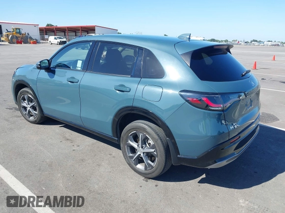 2023 Honda HR-V EX-L with VIN 3CZRZ1H77PM702998, listed as a IAAI auction lot 42267423 with 25,438 mi miles and . Bid and sale history available at DreamBid. Image 3.