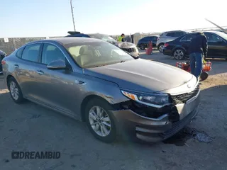 2016 Kia Optima LX with VIN 5XXGT4L39GG102599, listed as a IAAI auction lot 41748147 with 104,712 mi miles. Bid and sale history available at carsss.com. Image 1.
