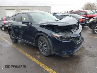 2018 Mazda CX-5 Grand Touring with VIN JM3KFBDM8J0345821, listed as a IAAI auction lot 41789284 with 1 mi miles. Bid and sale history available at carsss.com. Image 1.