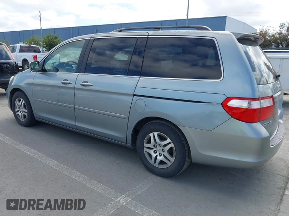 2007 Honda Odyssey EX-L with VIN 5FNRL38727B017587, listed as a IAAI auction lot 41900739 with 216,909 mi miles and . Bid and sale history available at carsss.com. Image 3.