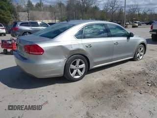 2013 Volkswagen Passat SE w/Sunroof & Nav with VIN 1VWBP7A37DC125598, listed as a IAAI auction lot 42022573 with 149,812 mi miles. Bid and sale history available at carsss.com. Image 4.