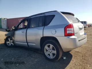 2010 Jeep Compass Sport with VIN 1J4NF4FB1AD672772, listed as a Copart auction lot 74220304 with 0 mi miles and Salvage Title. Bid and sale history available at carsss.com. Image 2.