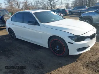 2013 BMW 3 Series 328i with VIN WBA3C1G56DNN93896, listed as a IAAI auction lot 41655351 with 111,782 mi miles. Bid and sale history available at carsss.com. Image 1.