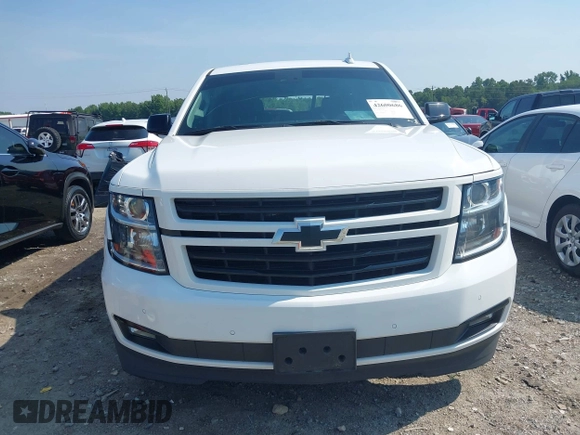 2019 Chevrolet Tahoe LT with VIN 1GNSCBKC2KR128944, listed as a IAAI auction lot 42600686 with 92,980 mi miles and . Bid and sale history available at DreamBid. Image 13.
