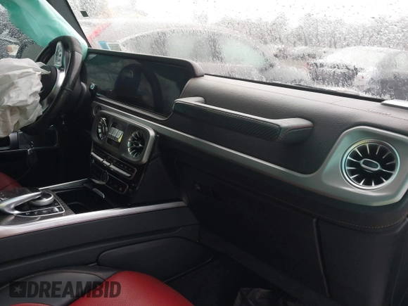 2019 Mercedes-Benz G 63 AMG with VIN WDCYC7HJXKX301279, listed as a IAAI auction lot 41427069 with 59,556 mi miles and . Bid and sale history available at DreamBid. Image 5.