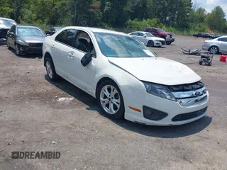 2012 Ford Fusion SE z VIN 3FAHP0HA7CR305713, wystawiony jako IAAI lot #40085503 z przebiegiem 213 003 mil mil oraz . Historia ofert i sprzedaży dostępna na DreamBid. Obrazek 1.
