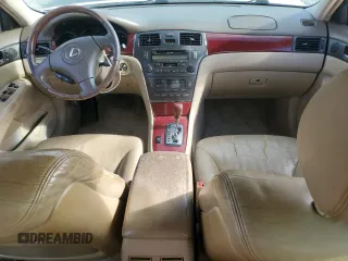 2002 Lexus ES 300 with VIN JTHBF30GX25018502, listed as a Copart auction lot 79828334 with 296,986 mi miles and Salvage Title. Bid and sale history available at DreamBid. Image 8.