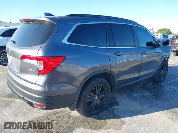 2022 Honda Pilot Special Edition with VIN 5FNYF5H25NB031399, listed as a IAAI auction lot 41638517 with 34,239 mi miles and . Bid and sale history available at carsss.com. Image 4.