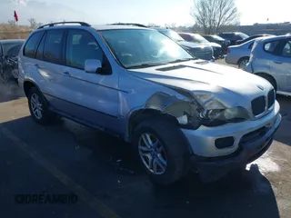 2005 BMW X5 3.0i with VIN 5UXFA13515LY20404, listed as a IAAI auction lot 41312604 with 210,149 mi miles. Bid and sale history available at carsss.com. Image 1.