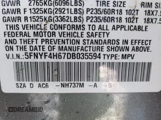 2013 Honda Pilot EX-L with VIN 5FNYF4H67DB035594, listed as a IAAI auction lot 41661166 with 133,950 mi miles and . Bid and sale history available at carsss.com. Image 9.