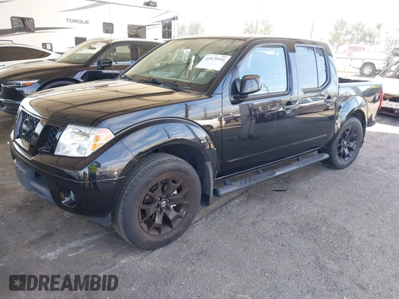 2020 Nissan Frontier SV z VIN 1N6ED0EA6LN724744, wystawiony jako IAAI lot #41879935 z przebiegiem 51 376 mil mil oraz . Historia ofert i sprzedaży dostępna na DreamBid. Obrazek 16.