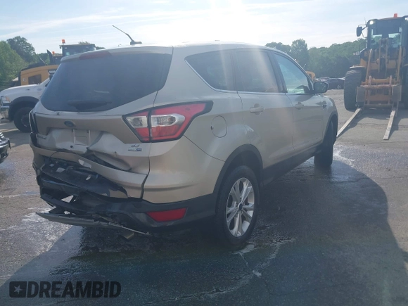 2017 Ford Escape SE with VIN 1FMCU9GD1HUC70823, listed as a IAAI auction lot 41898457 with 86,042 mi miles and . Bid and sale history available at DreamBid. Image 4.